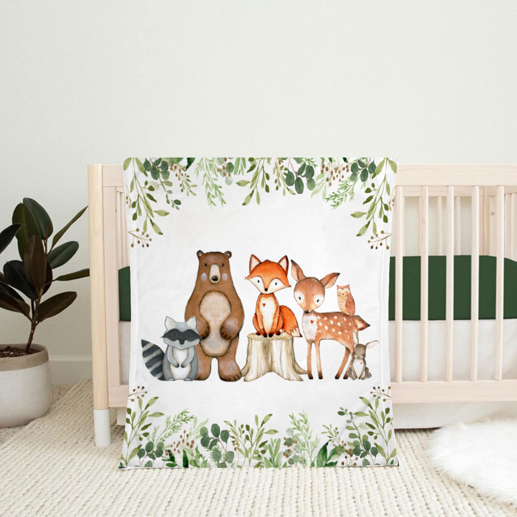 Yuzioey Popfavors woodland blanket used as newborn swaddle and cuddle accessory