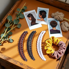 Yxinjy banana hair clip in brown holds voluminous hair in place.