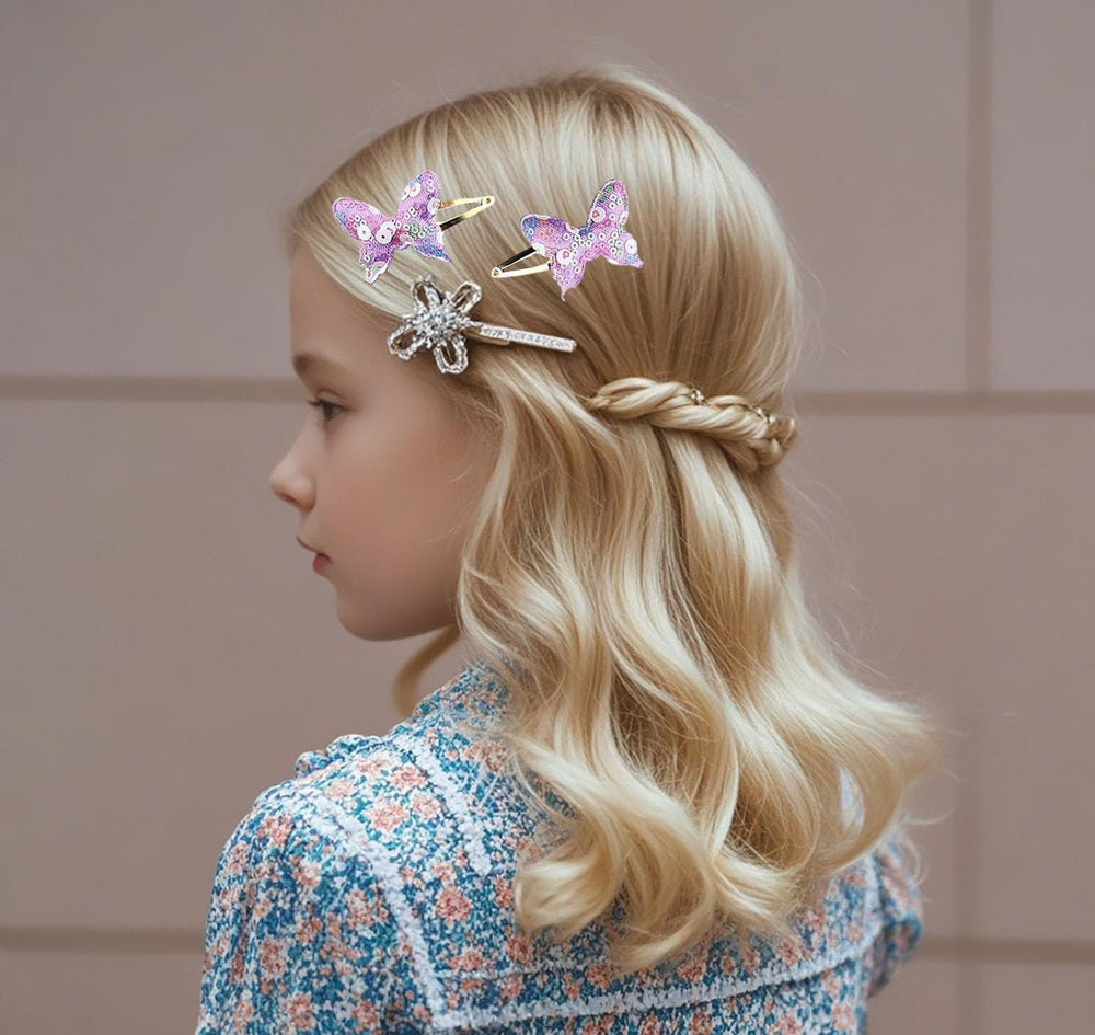 YYaaloa crown hair clip adds a playful touch to styles.