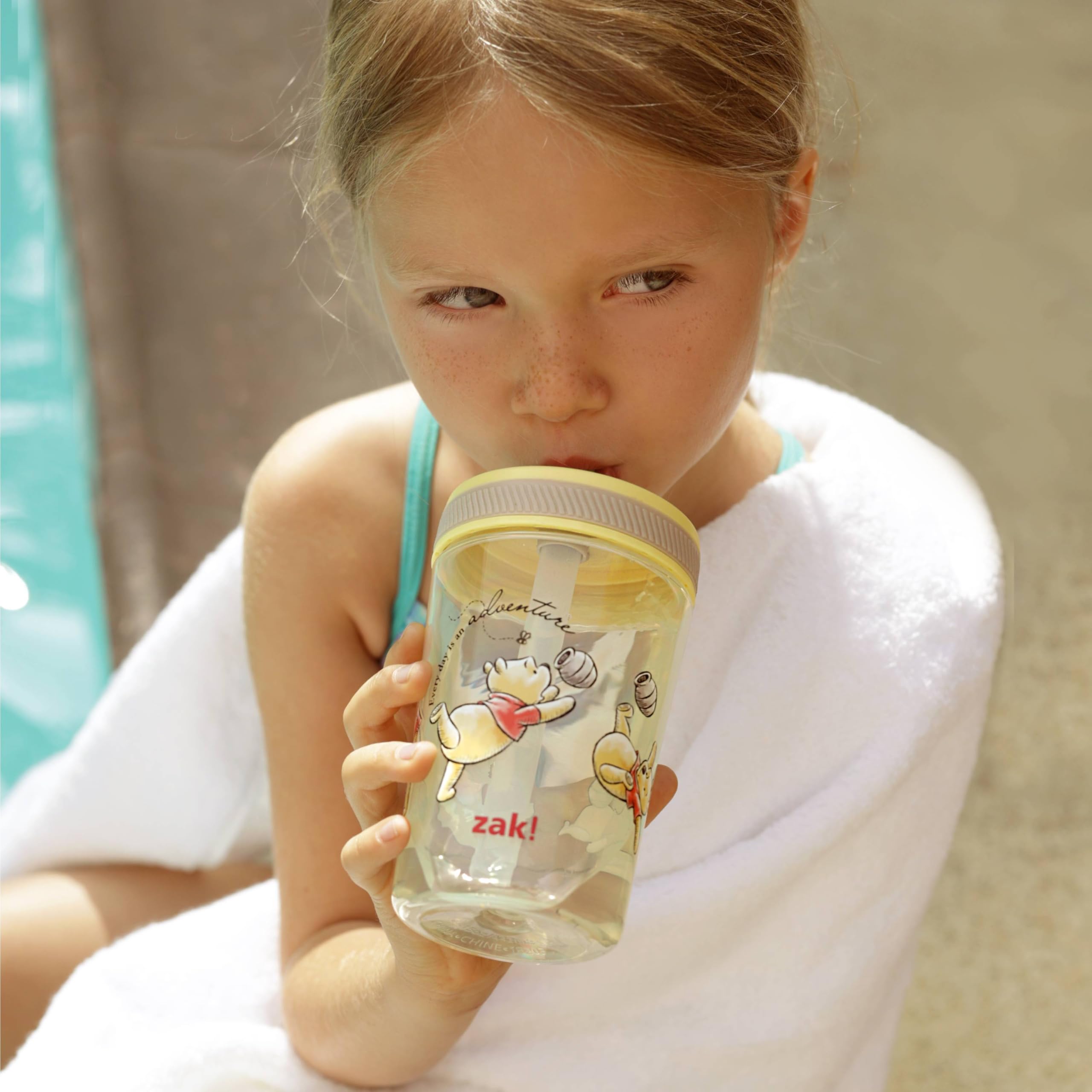 Zak Designs Winnie the Pooh Kelso cups with silicone straw for gentle sipping.