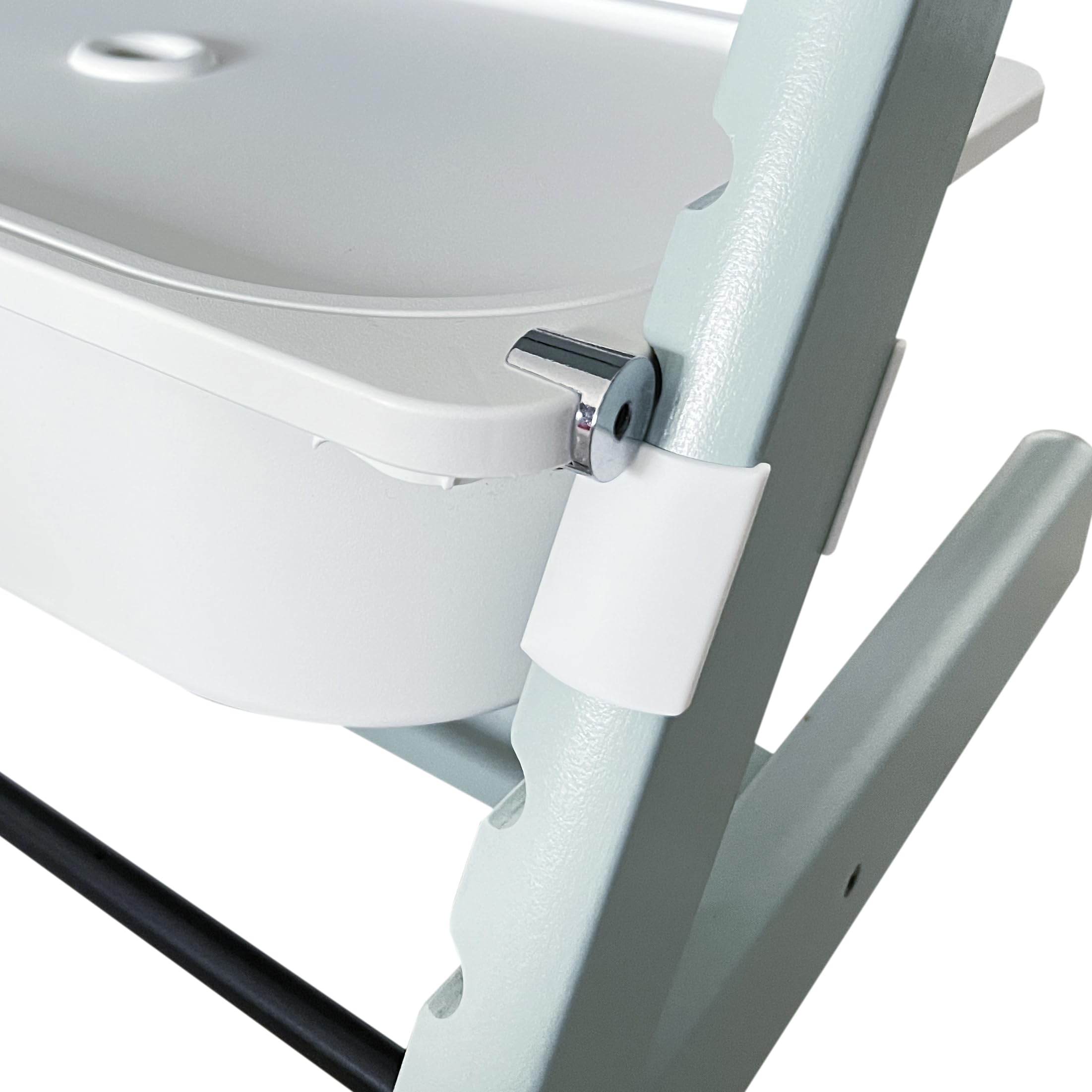 ZARPMA adapter shown with Stokke Tripp Trapp high chair for secure under-seat attachment.