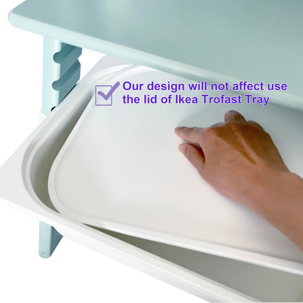 Stainless steel stoppers securing tray or basket in place.