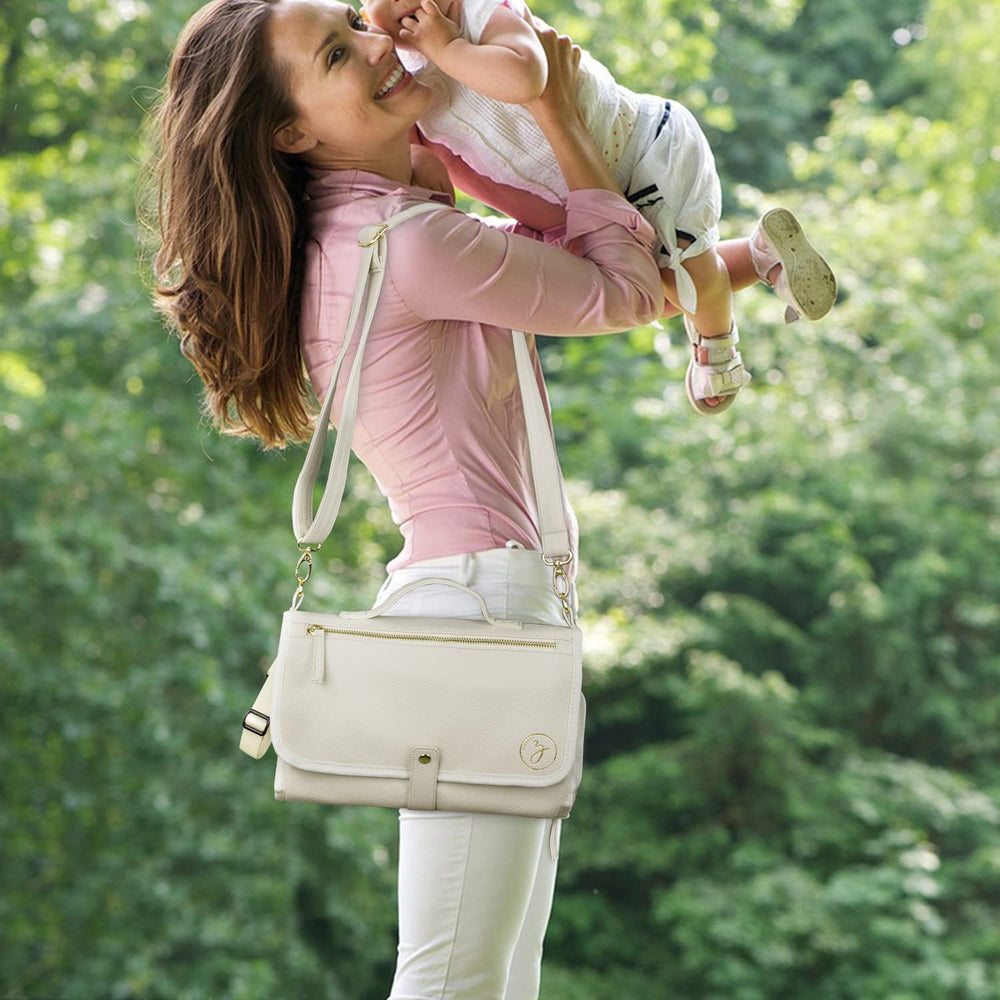 Zaveena portable pad for on-the-go use, ready in a diaper bag.