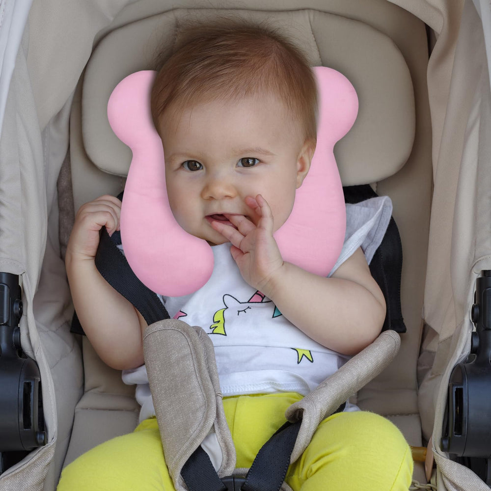 ZHOMA pink travel pillow supports newborns and toddlers for quick naps.