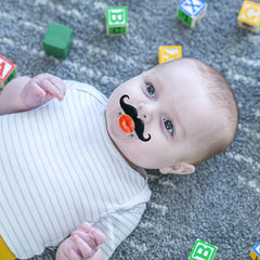 Zhovee mustache pacifier on baby, cute design for soothing
