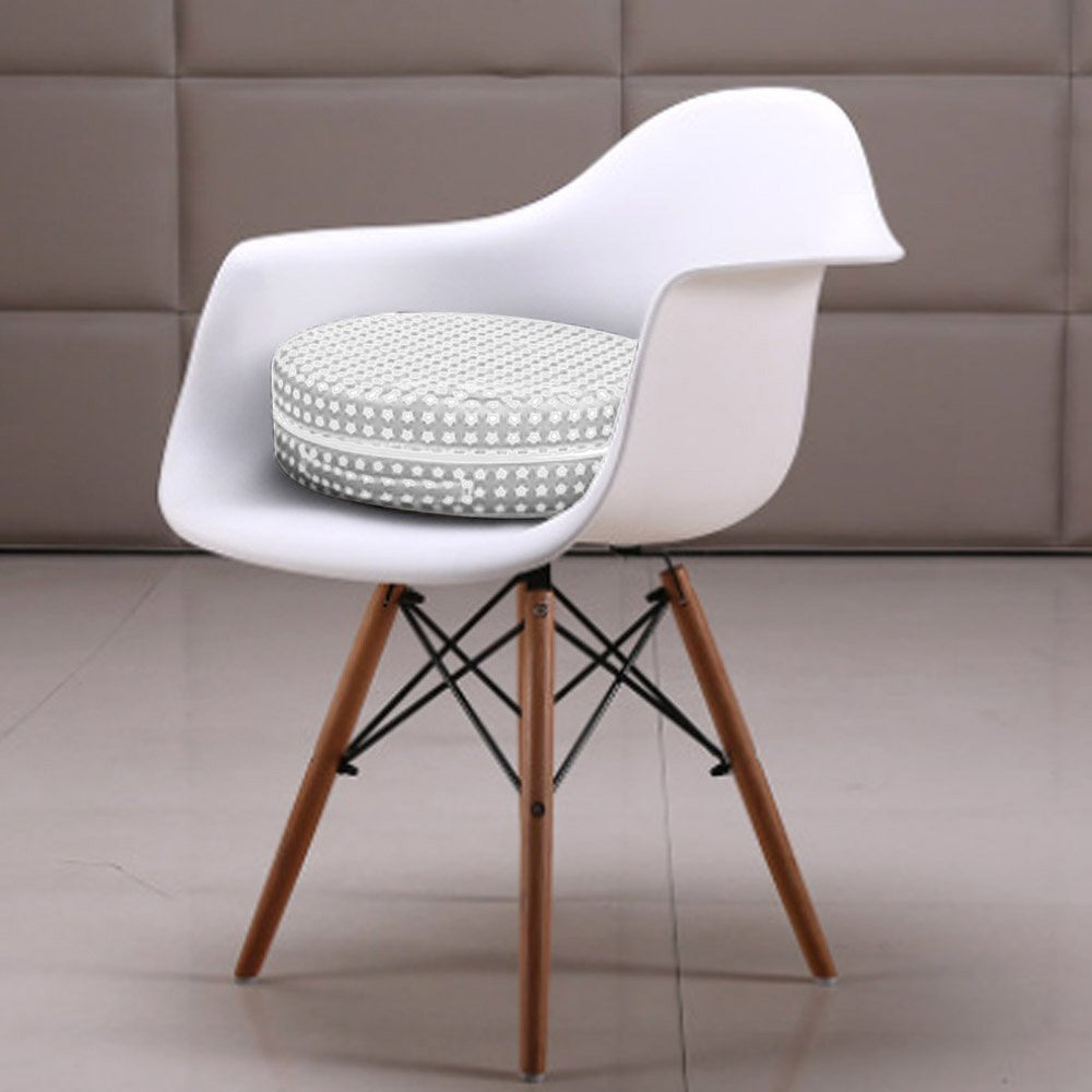 Versatile booster converts to floor mat in living room or nursery.