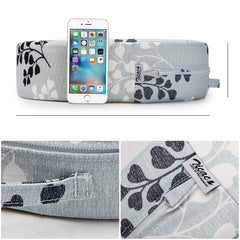 Zicac portable booster seat with lightweight handle for travel and dining out.