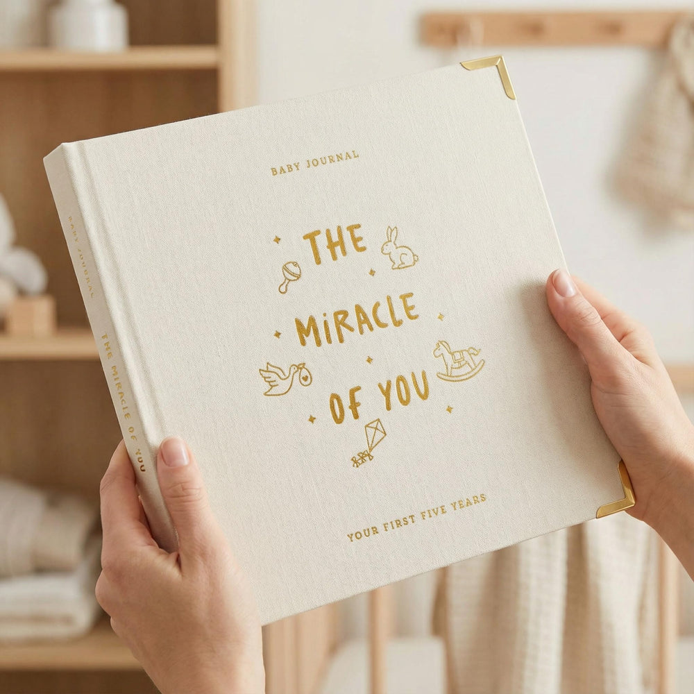 ZICOTO baby memory book with linen cover for lasting milestones.