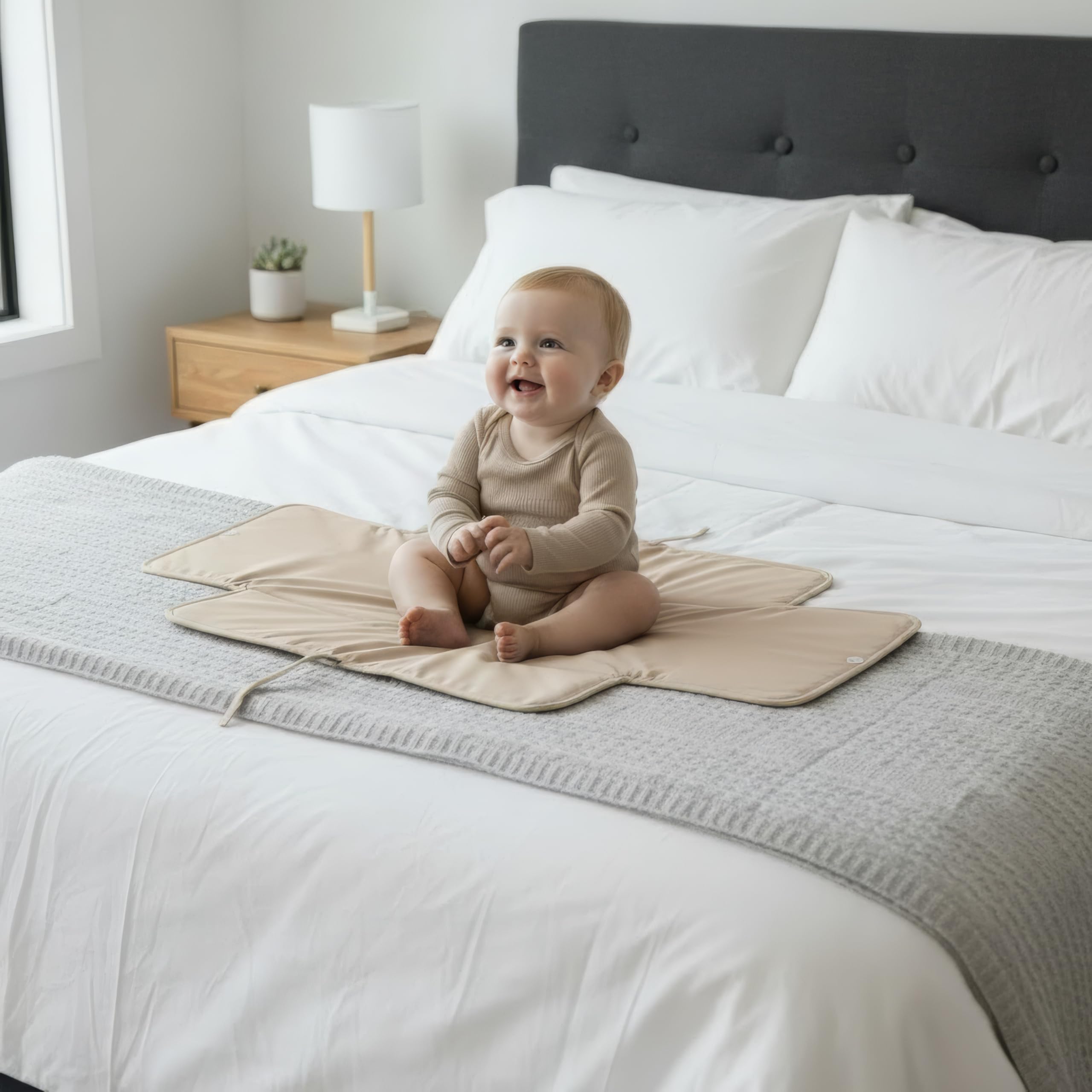 Elastic band on ZICOTO pad secures it in a diaper bag or organizer