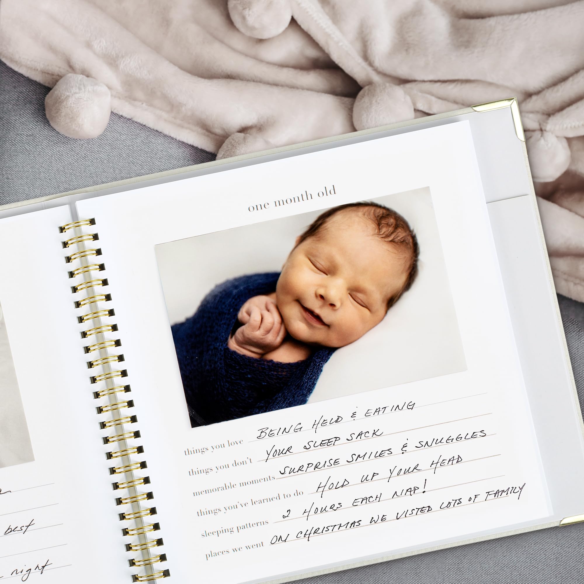 ZICOTO memory book interior layout for easy milestone journaling.