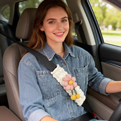Zigihos pink flower car strap pad eases shoulder fatigue.