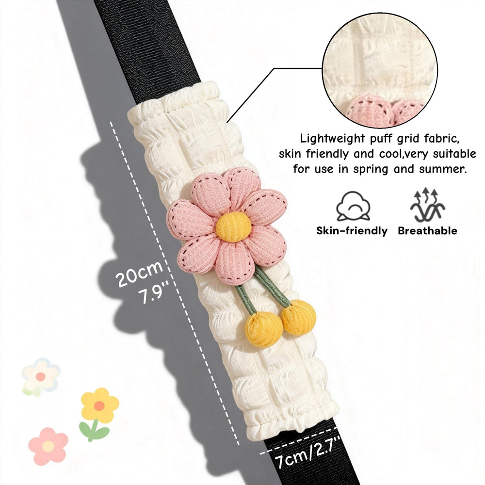 Zigihos pink flower seatbelt pad on belt adds cushioned support.
