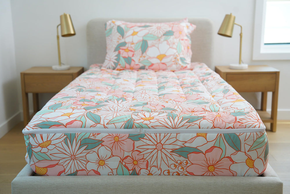 Zipit Bedding zippered side pockets offer handy storage for bedtime essentials.