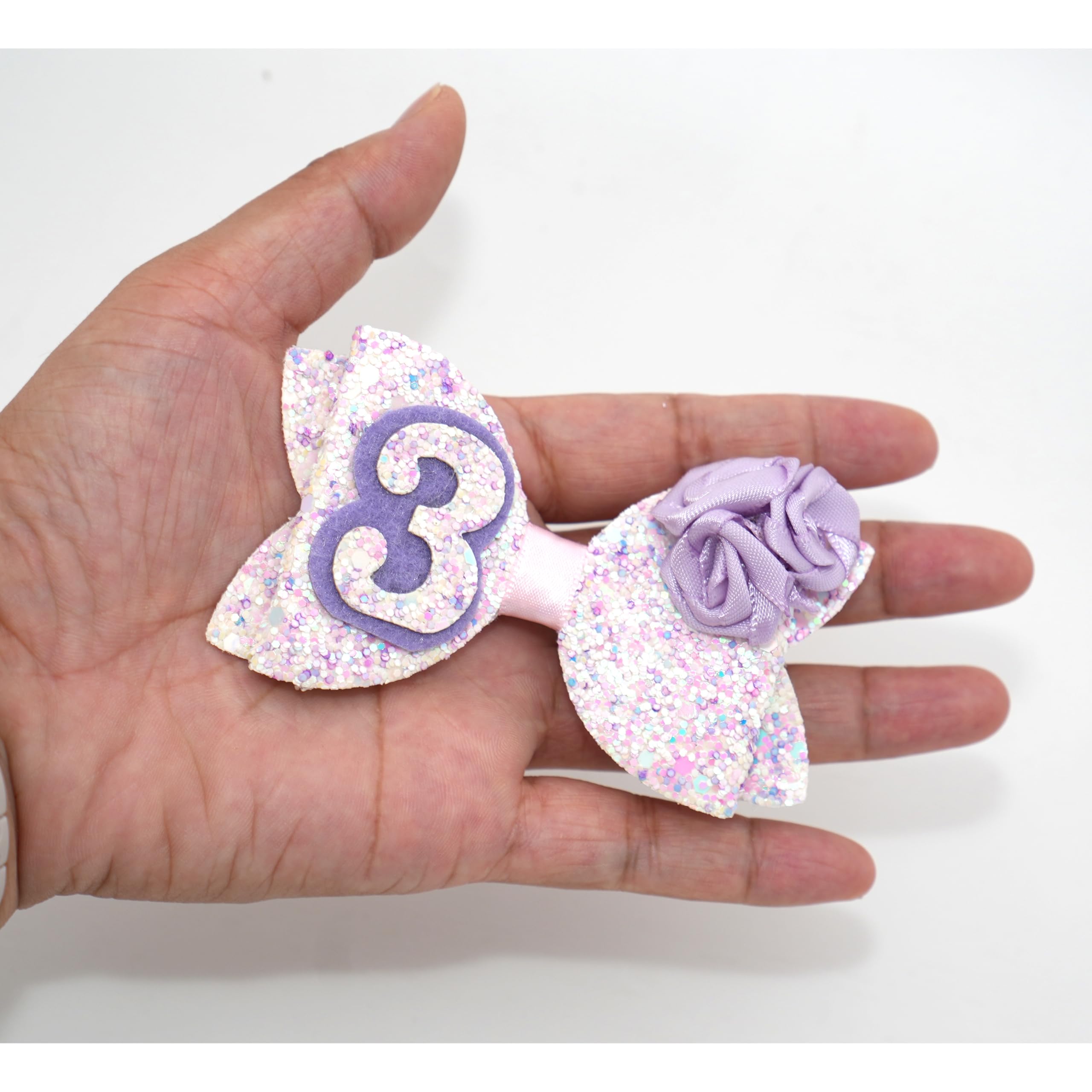 Zlwse birthday bow with alligator clip keeps hairstyle in place.