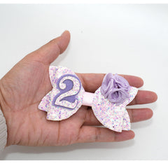 Zlwse handmade bow sized about 3.5 by 2.8 inches for balanced styling.