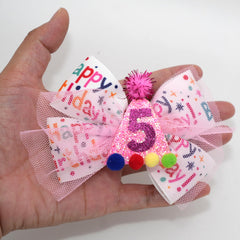 Zlwse sprinkle bow on toddler, perfect for birthday outfits and photos.