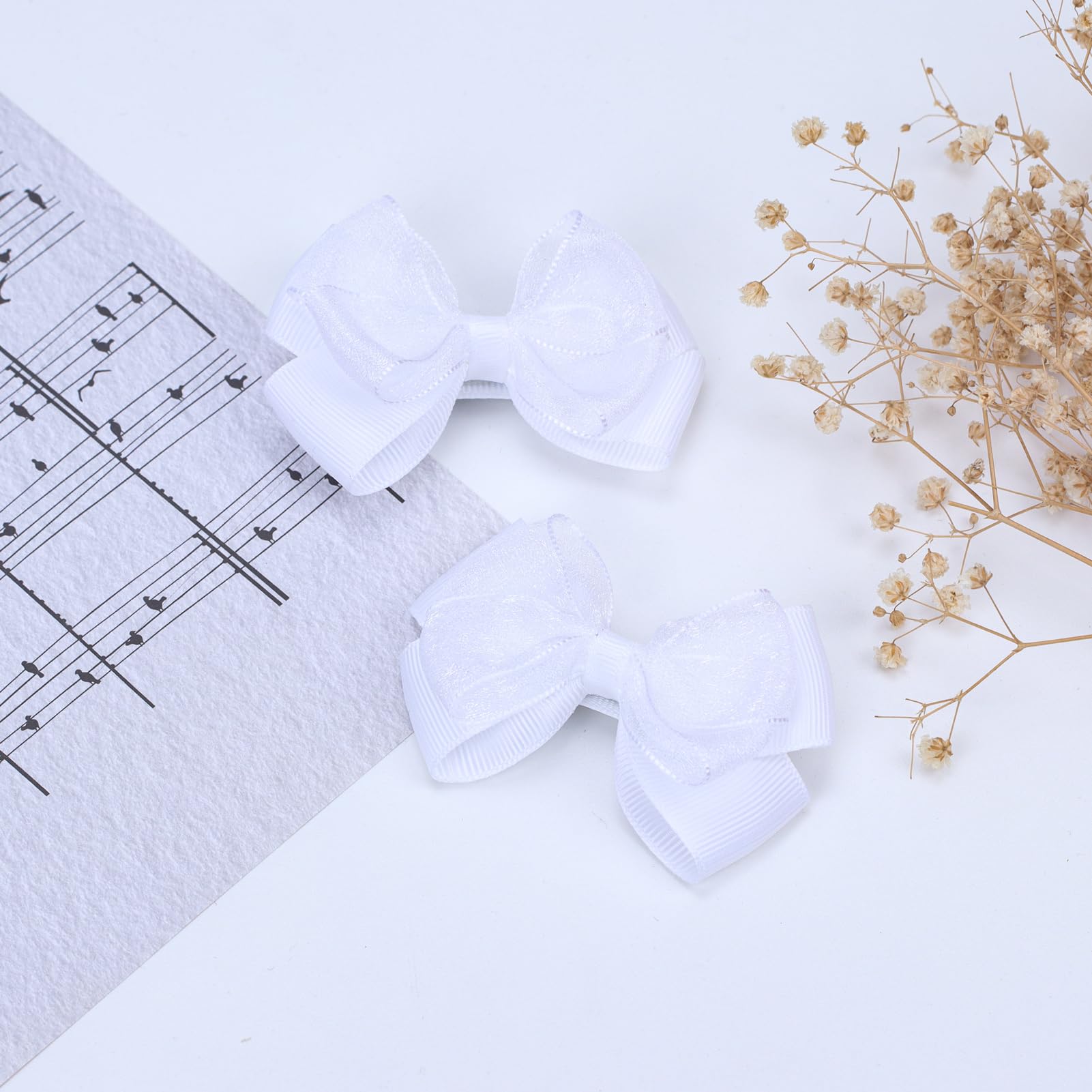 Zolyco baby girl bow clip on white organza for everyday wear