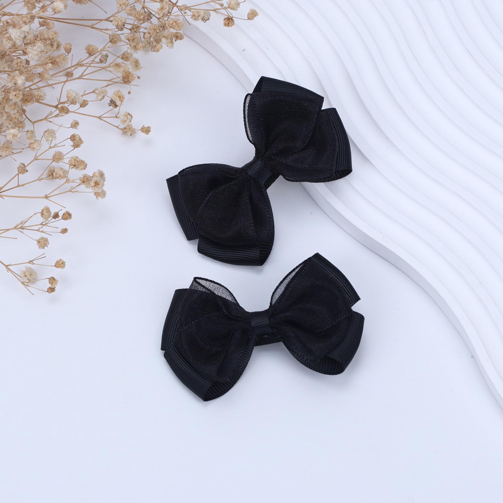 Zolyco black organza bow clip enhances everyday outfits with cute detail.