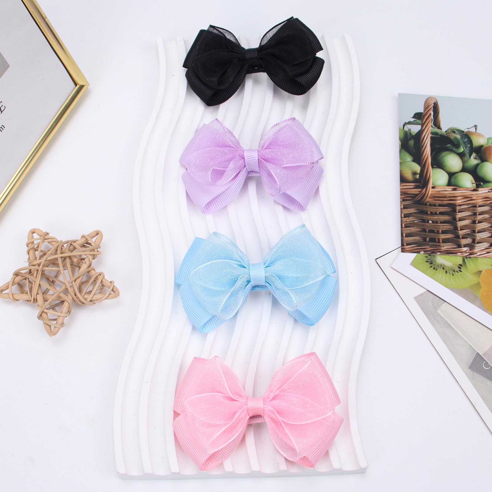 Zolyco Baby bow clips, soft texture and secure grip.
