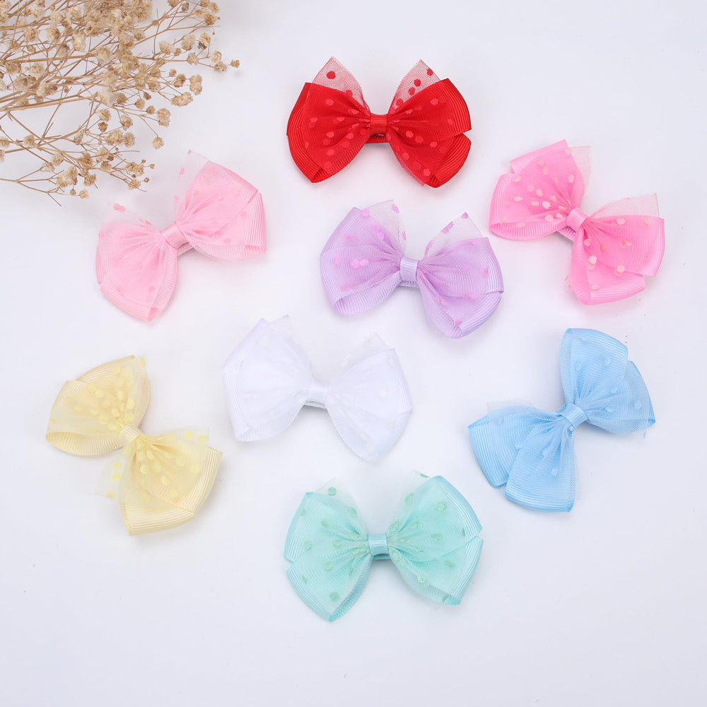 Zolyco Tiny Dot Organza Bow Purple Alligator Clip displayed with different outfits.