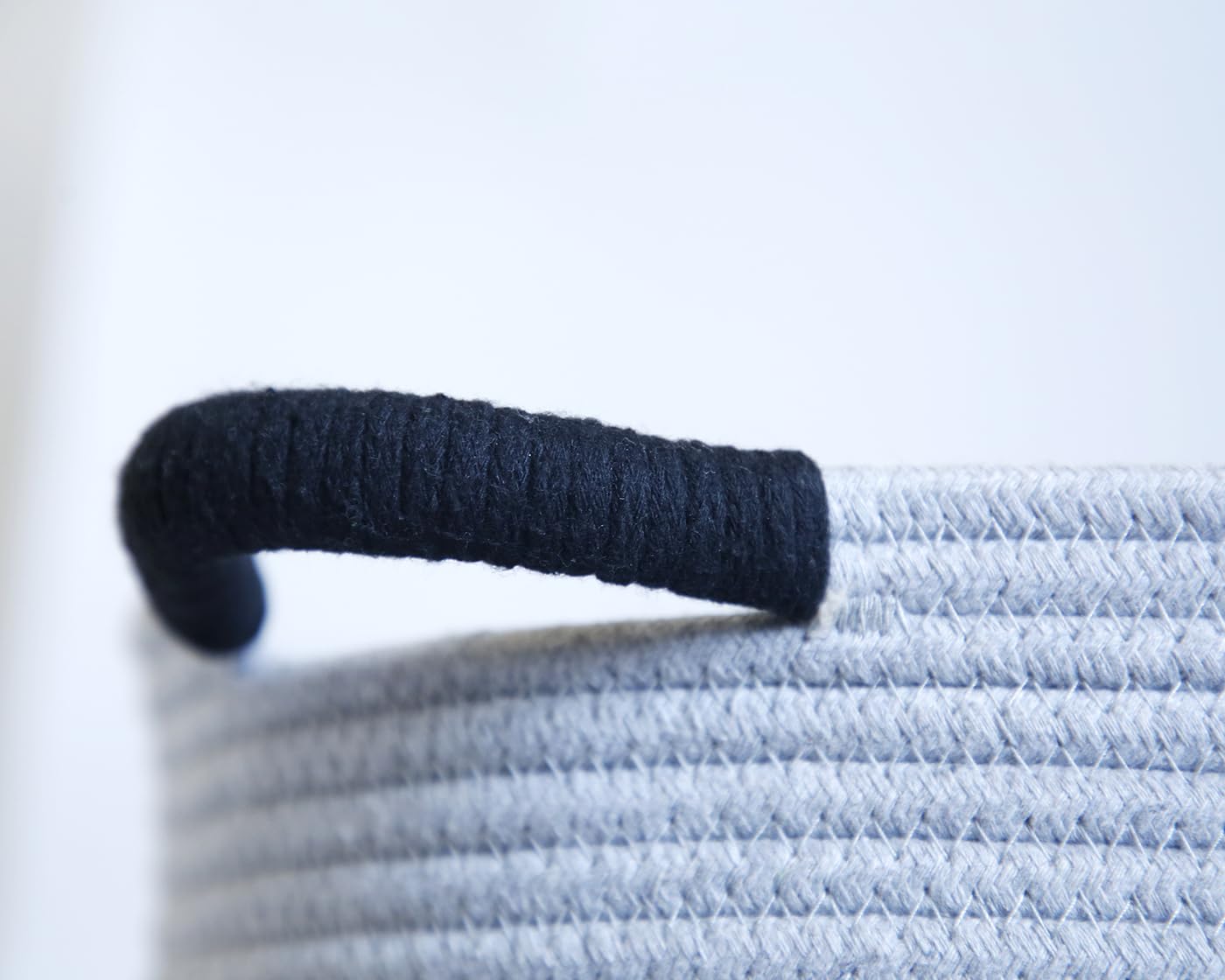 Zombati Woof dog basket white suits minimalist spaces for blankets and toys.