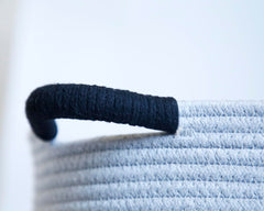 Zombati Woof dog basket white suits minimalist spaces for blankets and toys.