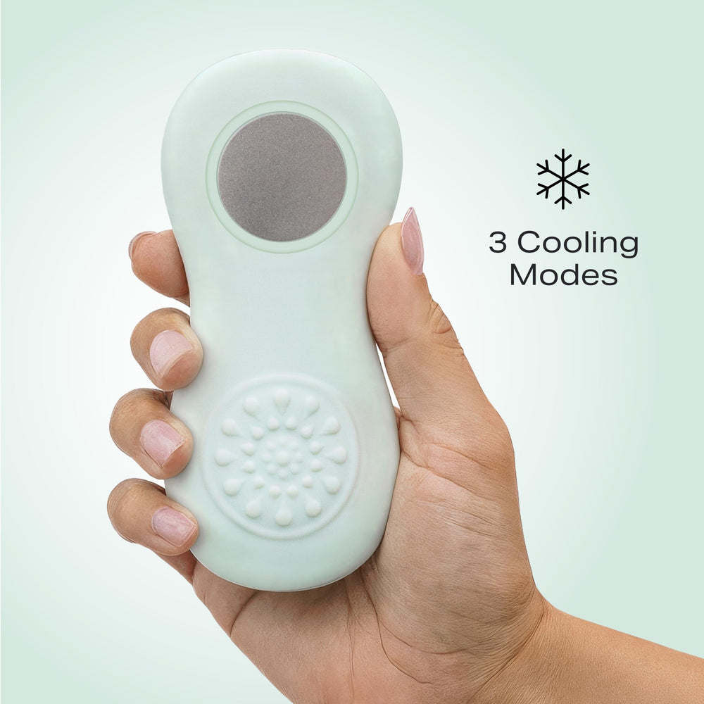 Zomee massager in use during pumping for comfortable milk flow.