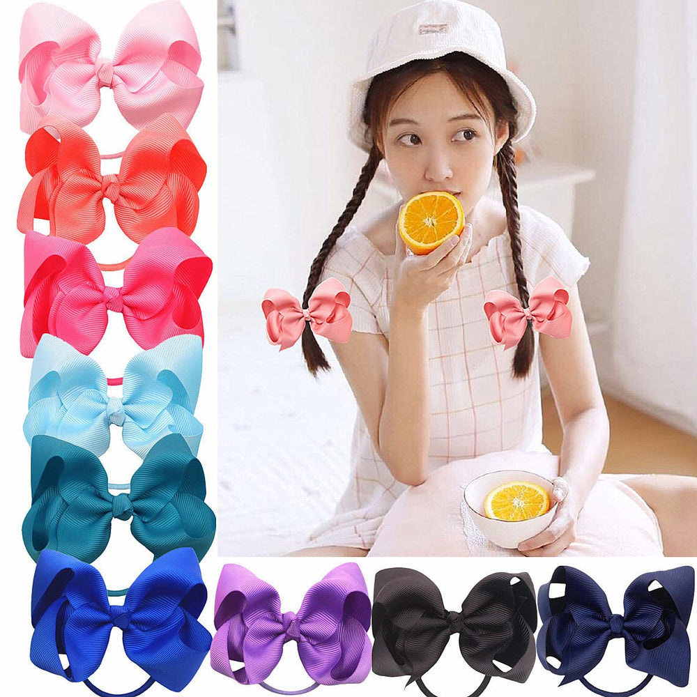 ZOONAI 4-Inch black hair bows side view on a kid.