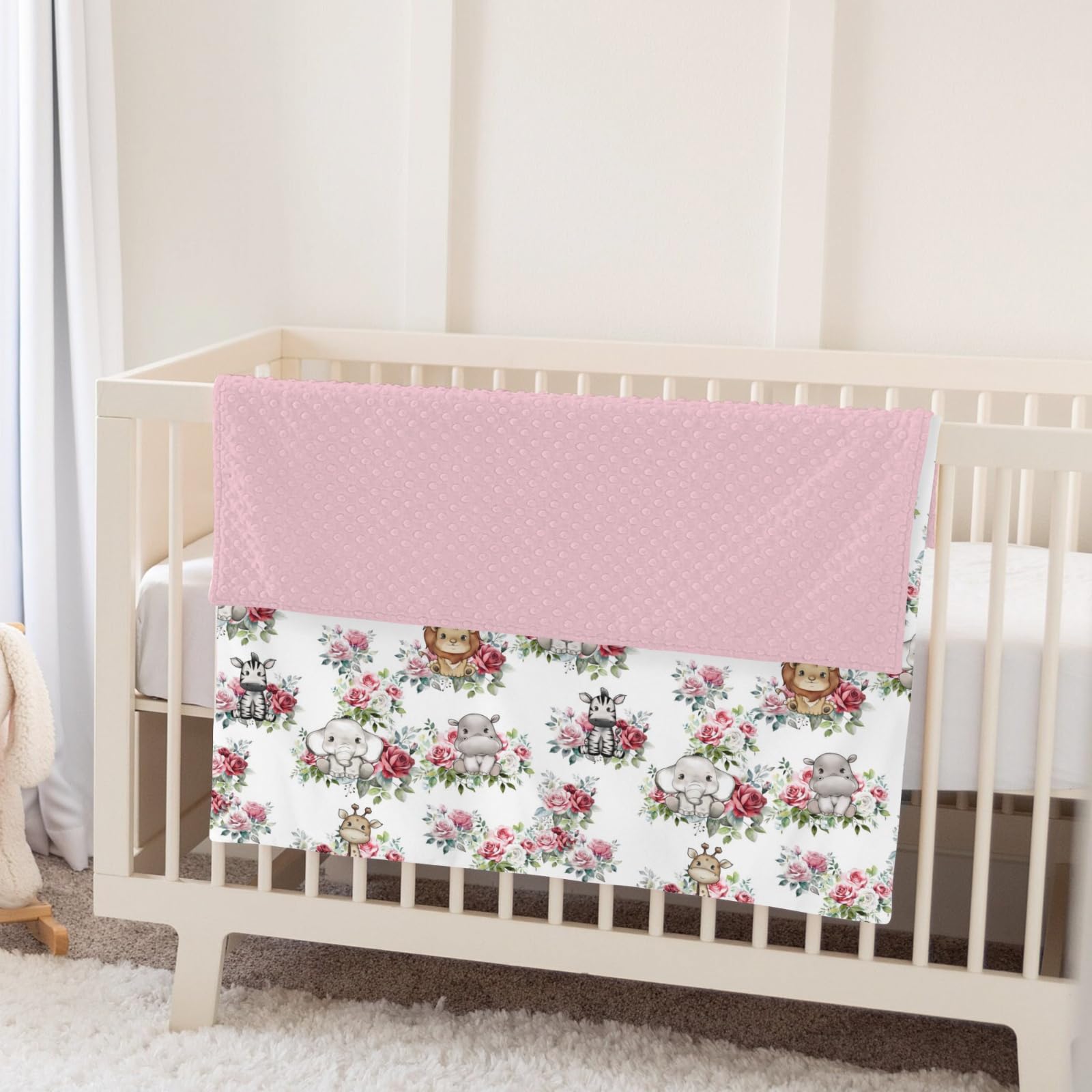 ZoUbqchY safari blanket in crib adds cozy decor for naps.