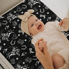 ZoUbqchY soft silky polyester fabric close-up emphasizes breathable, gentle touch for baby during daily changes.