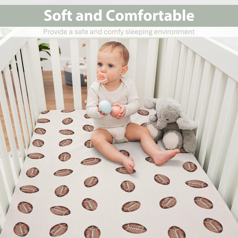ZoUbqchY watercolor football print keeps nursery coordinated and stylish.