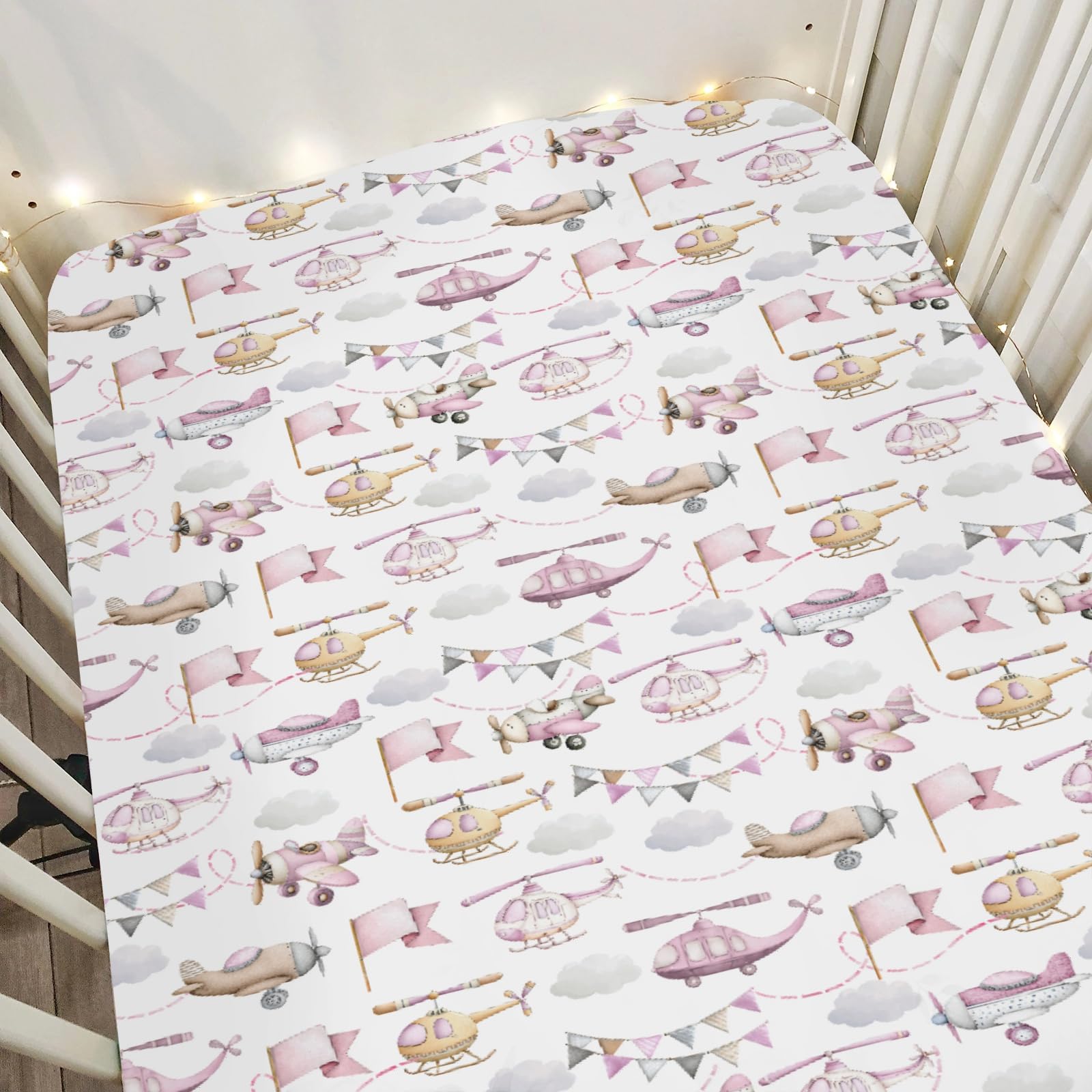 ZoUbqchY watercolor pink airplanes crib sheet adds cozy bedtime ambiance.