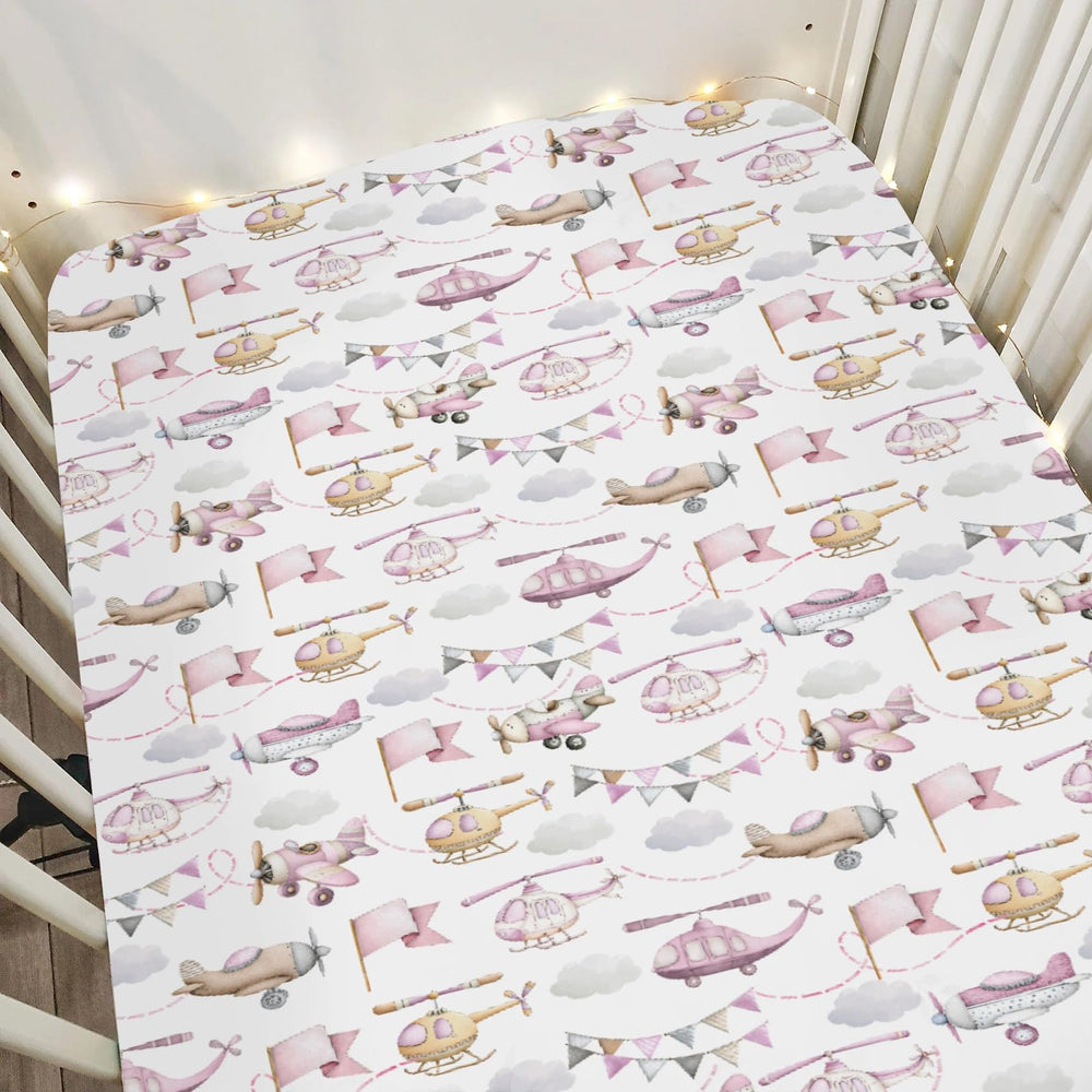 ZoUbqchY watercolor pink airplanes crib sheet adds cozy bedtime ambiance.