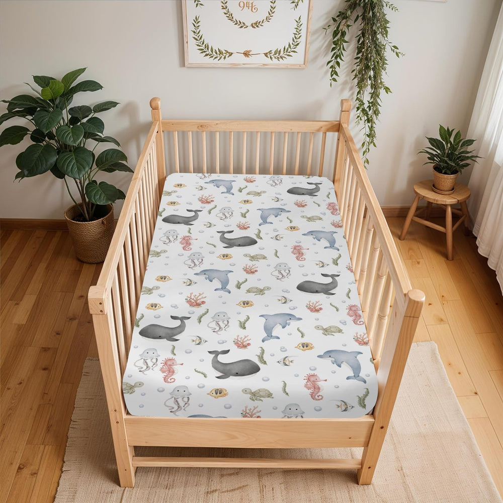 ZoUbqchY fits standard crib and toddler mattresses up to 9 inches.
