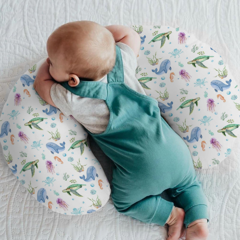 ZoUbqchY cover with turtle motif supports calm feeding and nursery decor