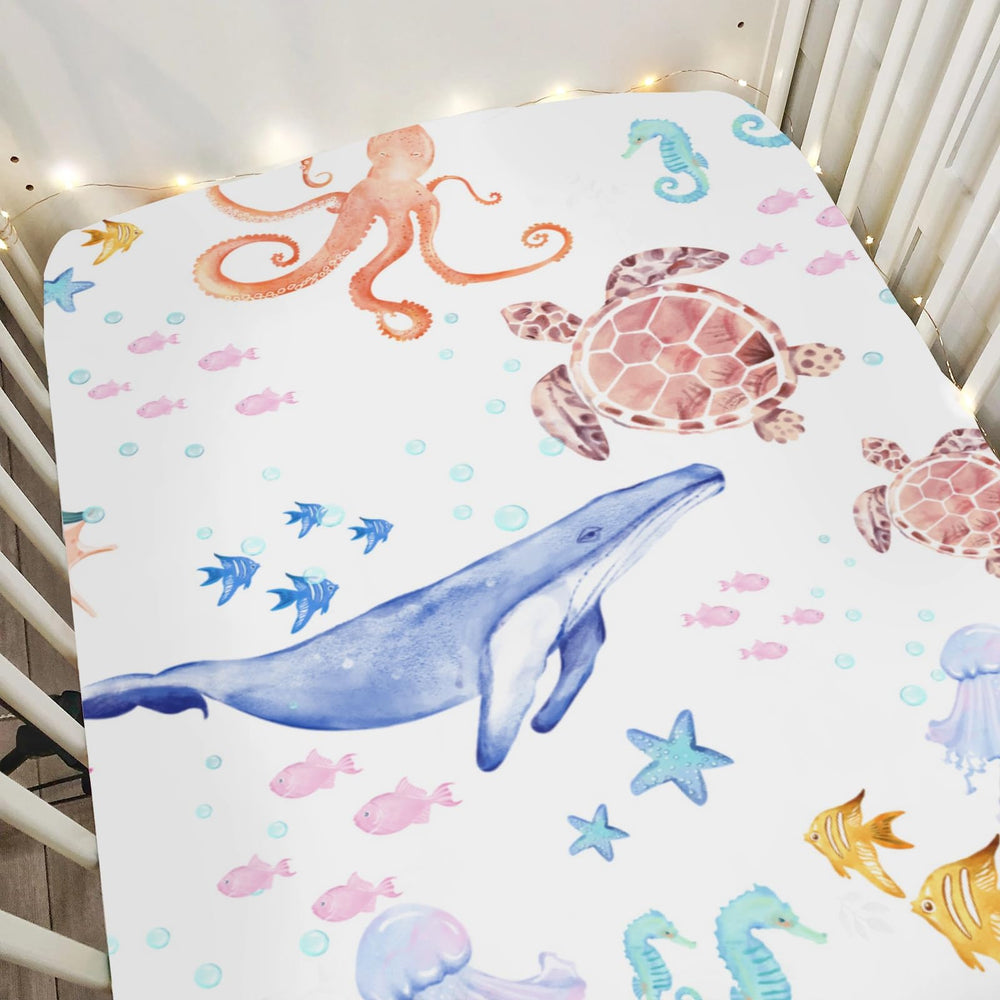 ZoUbqchy colorful ocean animals crib sheet shows vibrant sea life for a cozy nursery.