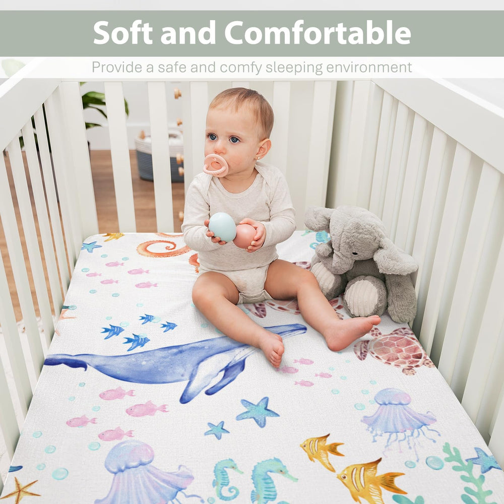 ZoUbqchy silky polyester crib sheet feels soft against baby's skin.