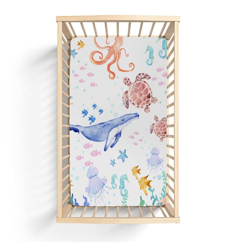 ZoUbqchy machine-washable crib sheet simplifies nursery care.