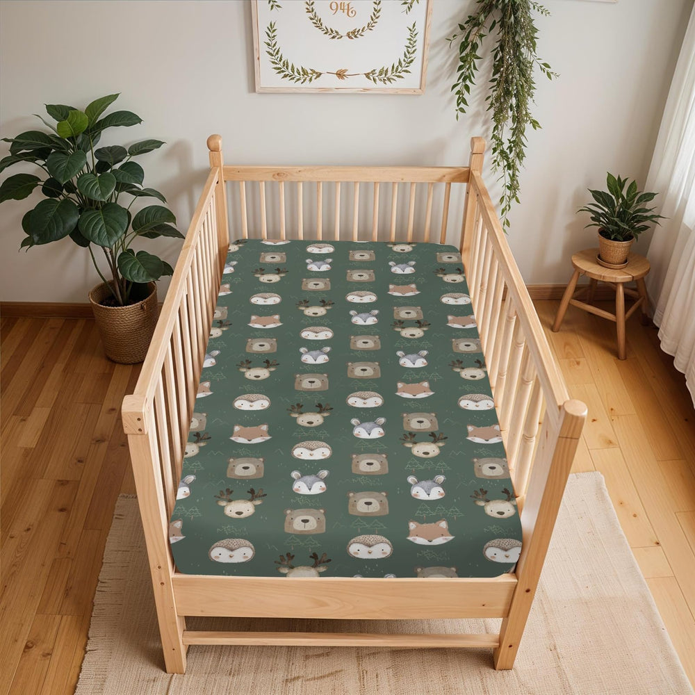 ZoUbqchY deer crib sheet with secure edge keeps the blanket flat and safe.