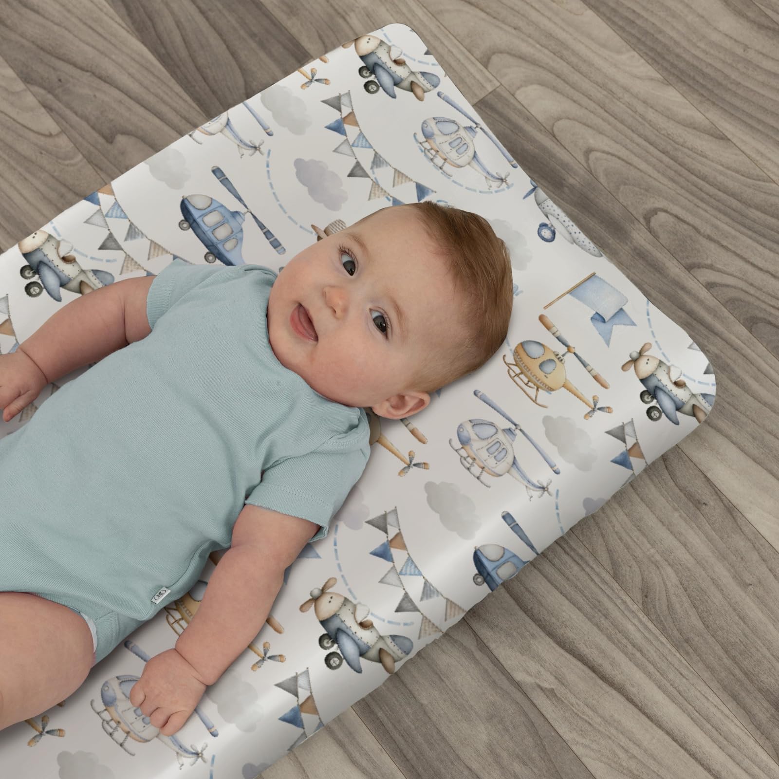 ZoUbqchY elastic-fit changing pad cover blue stays secure during use.