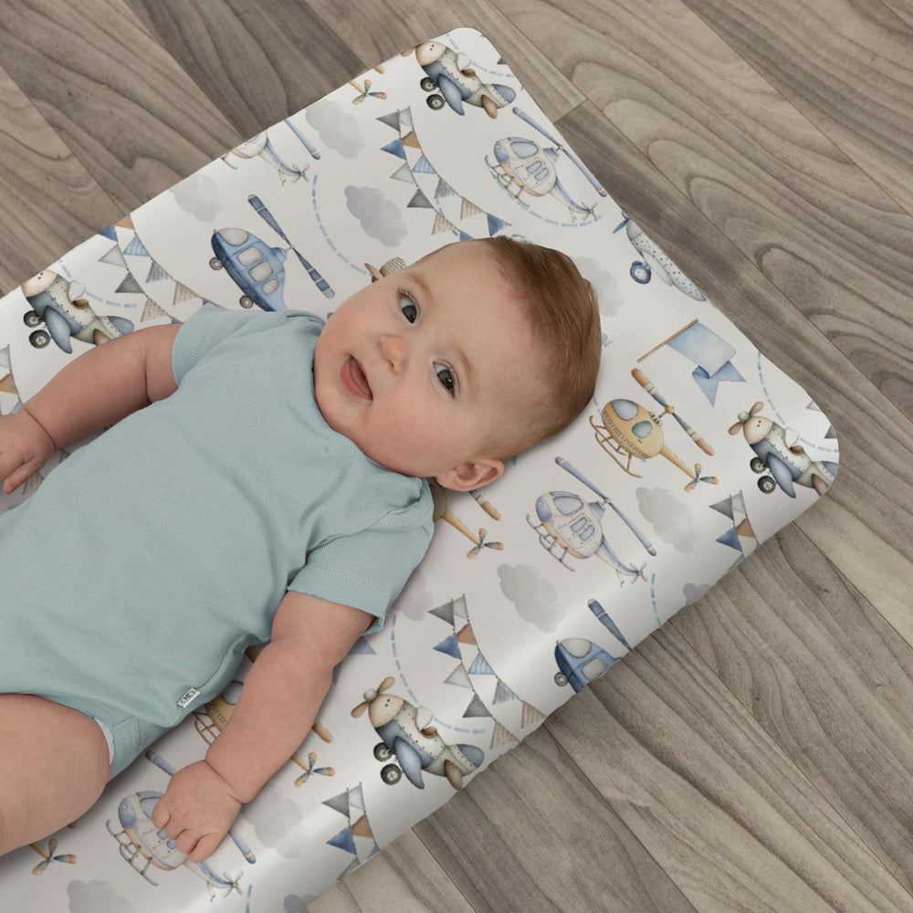 ZoUbqchY elastic-fit changing pad cover blue stays secure during use.