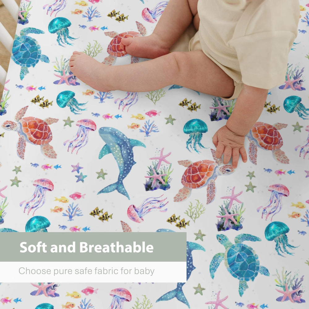 ZoUbqchY corals crib sheet creates vibrant, soothing sleep space