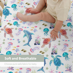 ZoUbqchY corals crib sheet creates vibrant, soothing sleep space