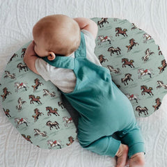 ZoUbqchY green nursing cover on pillow close-up shows soft, breathable polyester