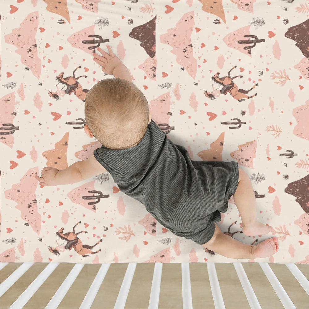 ZoUbqchY Muted colors and playful patterns create a calming sleep corner.