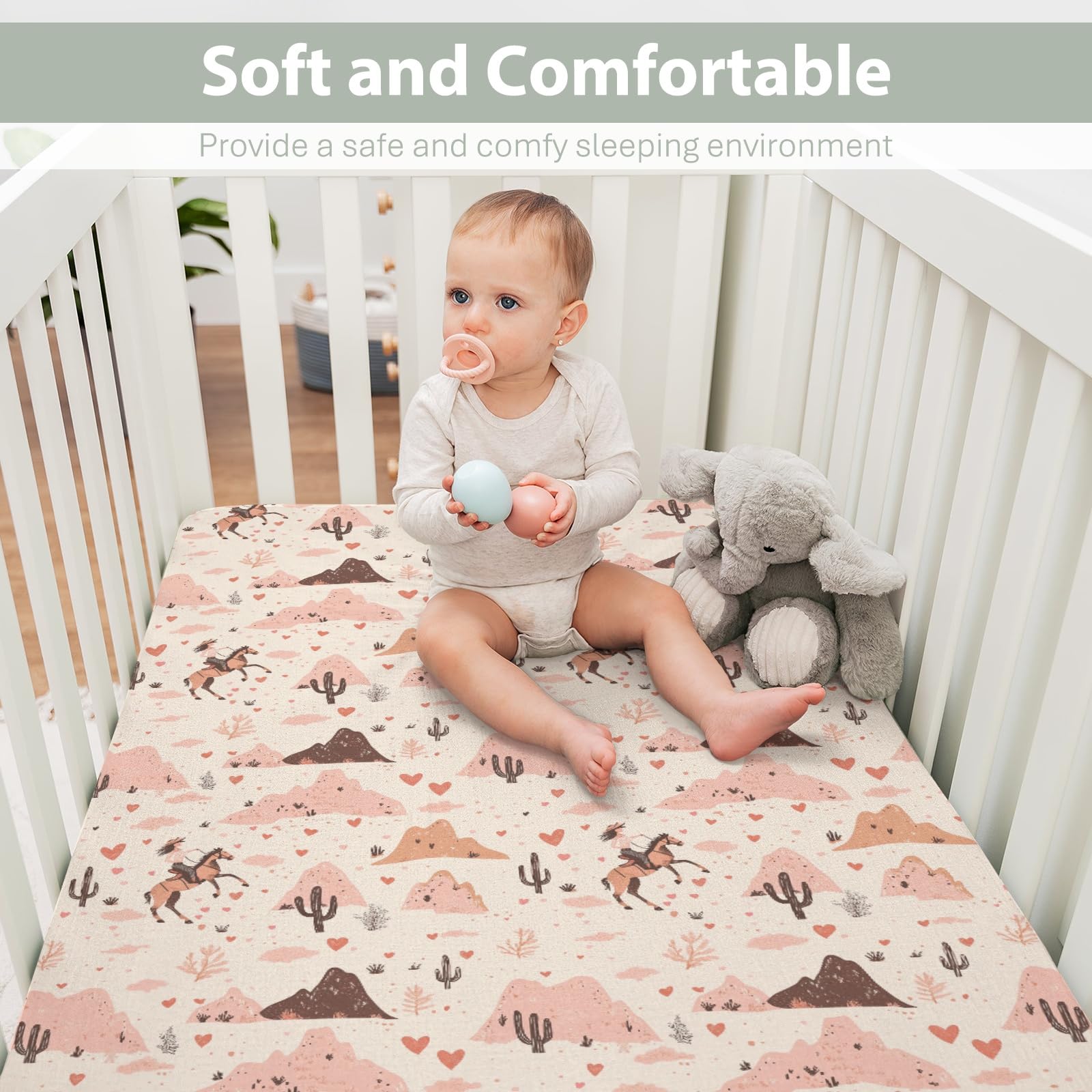 ZoUbqchY Pink desert-inspired crib sheet adds cozy style to nurseries.