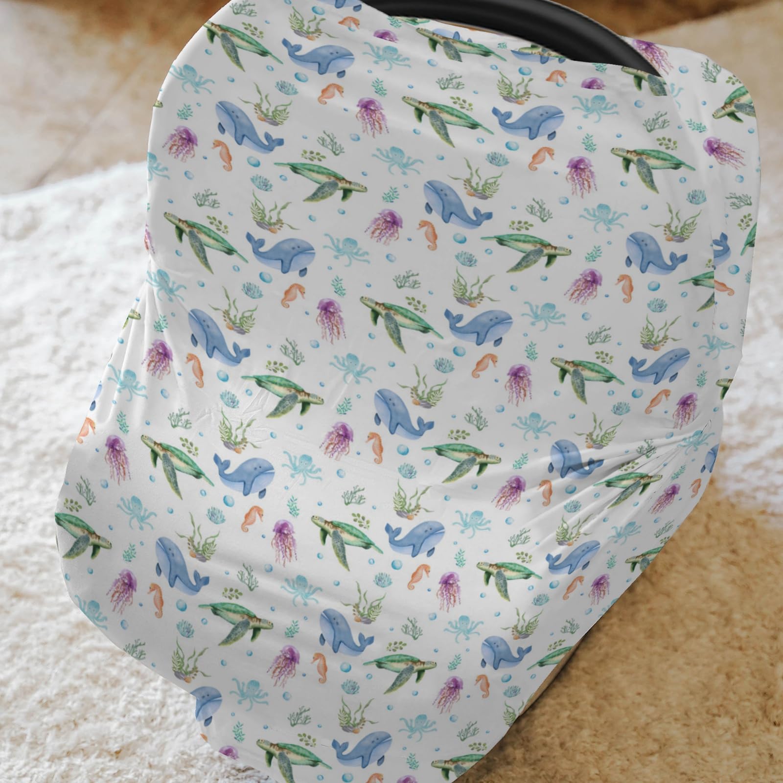 ZoUbqchY sea horse car seat cover offers quick nursing privacy.