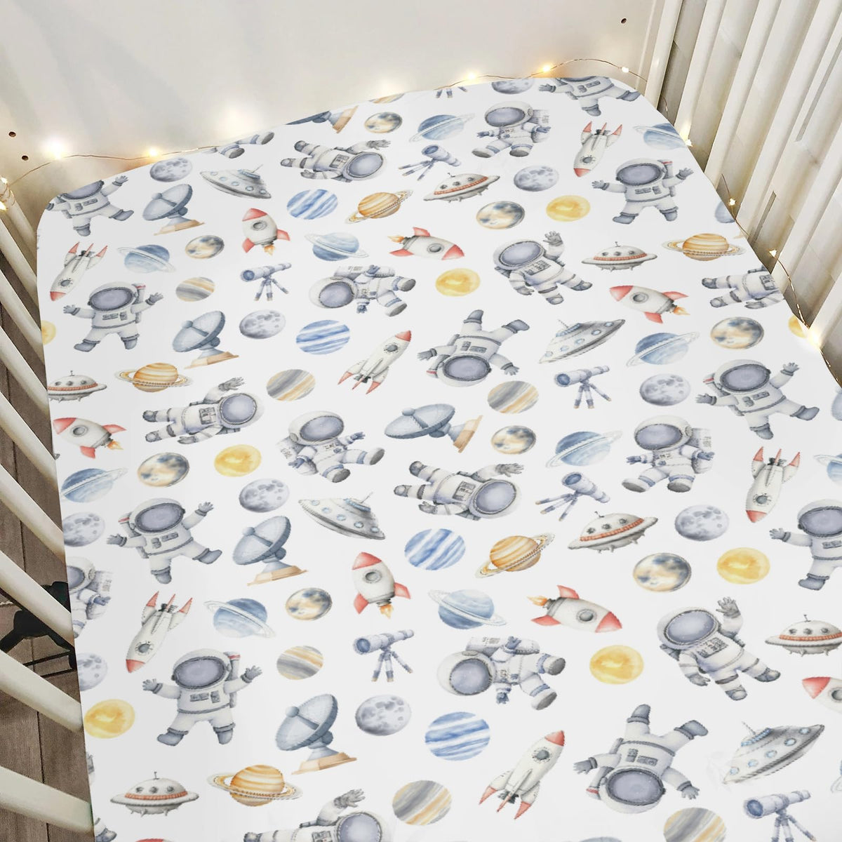 ZoUbqchY Space Astronaut Rocket Watercolor crib sheet for a cozy, engaging nursery.