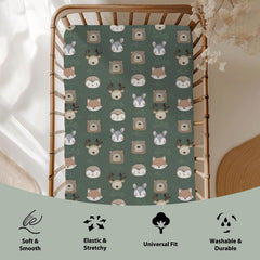 ZoUbqchY trees design crib sheet brightens nursery while remaining practical.