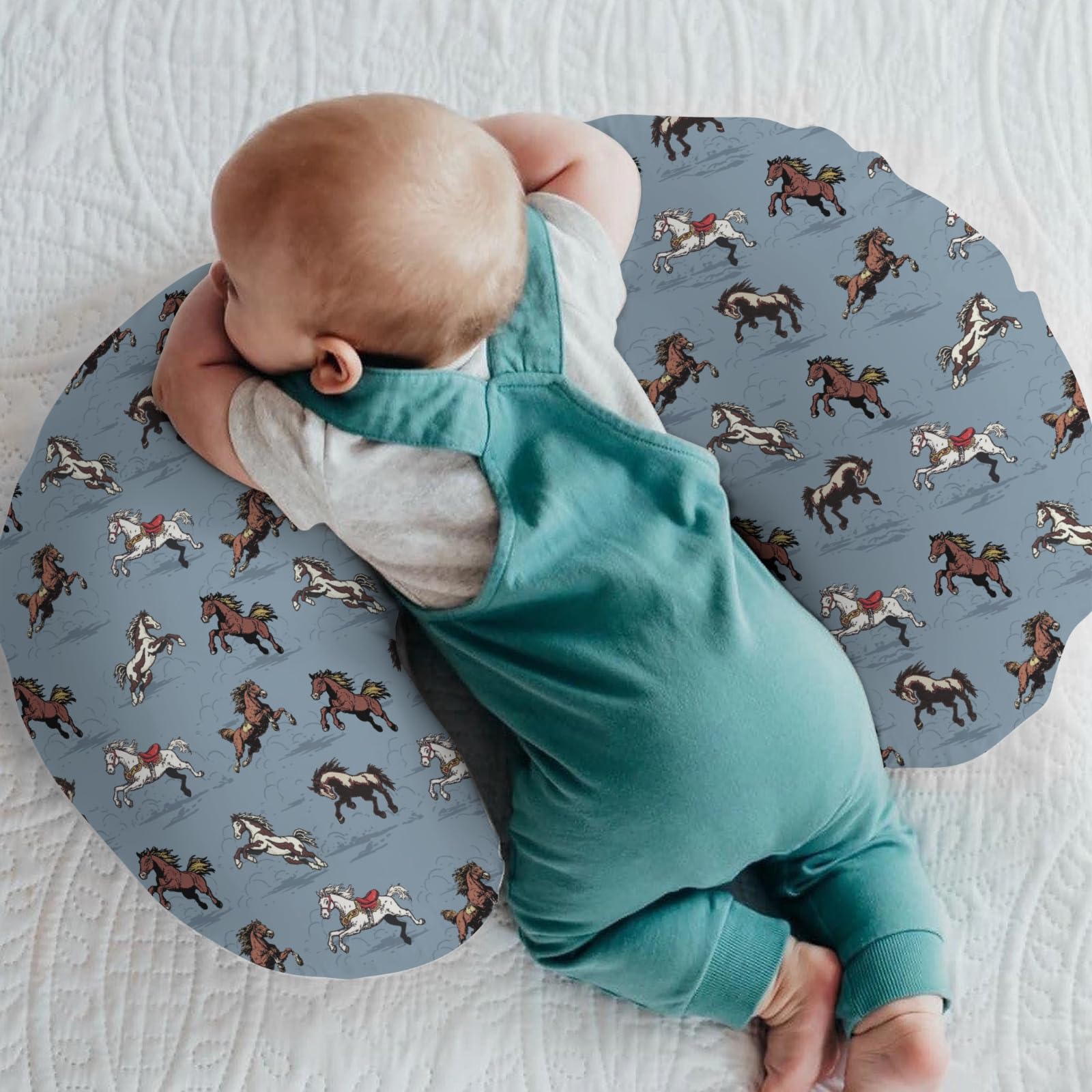 ZoUbqchY blue nursing cover on a pillow, showcasing cozy breathable fabric for baby feeding.